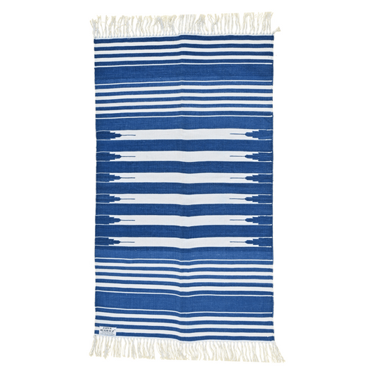 Elevate your space with the timeless appeal of the "Handwoven Blue and White Stripe Cotton Rug with Fringes." Its classic blue and white stripes exude elegance, while the fringes add a charming touch. Handcrafted with care, this rug brings both style and comfort to any room in your home.