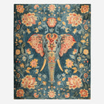 Elephantine Garden Hand Tufted Area Rug with an intricate design featuring a central elephant motif surrounded by vibrant floral patterns. Perfect for enhancing living room aesthetics, this wool rug combines elegance and artful detail, ideal for those seeking unique living room area rugs.