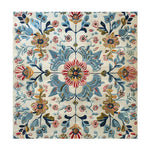 A beautiful square area rug featuring a floral design in vibrant colors, perfect for large living rooms or office spaces. This hand-tufted wool rug showcases intricate patterns with blue, pink, and gold flowers, adding an elegant touch to any room.