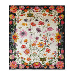 Blooming Ivory Garden Hand Tufted Area Rug featuring vibrant floral patterns, perfect for enhancing large living rooms. This wool rug showcases a colorful arrangement of flowers on a soft ivory background, making it an ideal choice for rugs in the living room.
