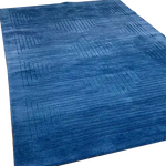 A stylish Blue Arctic Geo Modern Hand Tufted Wool Area Rug measuring 8 x 10 ft. Perfect for adding a contemporary touch to living rooms and dining rooms, this rug features a geometric pattern that enhances any space. Ideal as a focal point in your living room or as a sophisticated dining room area rug, its wool construction ensures durability and comfort.