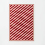 Candy Everyday Hand Tufted Wool Rug rug with a striped pattern on a white background