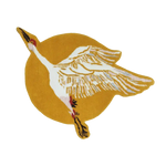 An elegant Chinoiserie Crane over the Sun hand-tufted wool area rug, perfect for enhancing the aesthetic of office, living room, or dining room spaces. The round rug features a graceful crane with outstretched wings against a warm sun backdrop, adding a touch of sophistication to formal dining room settings.