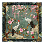 This hand-tufted area rug showcases a stunning design featuring elegant cranes among blooming cherry blossoms. The intricate details and vibrant colors bring life to any room, creating a serene and artistic atmosphere.