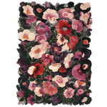 The Crimson Flower Cascade Hand Tufted Rug is a stunning area rug featuring a vibrant floral design. Perfect for adding a splash of color to your living room, this large wool rug showcases an array of red, pink, and purple flowers, making it an ideal choice for those seeking beautiful area rugs for living rooms.