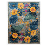 Ethereal Garden Lullaby Hand Tufted Rug featuring a vibrant floral pattern with large green leaves and bright yellow flowers. This wool area rug is perfect for adding a touch of elegance to your living room. Ideal for those seeking large area rugs for living room spaces, it combines beauty with functionality.