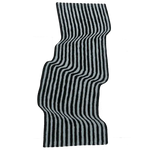 Top view of a flowing illusion black and gray wool area rug with wavy stripes, perfect as a vintage rug for the dining room, office, kitchen, or as a hallway runner rug. This contemporary rug adds a stylish touch as a wool rug, ideal for rugs for office, dining room carpets, kitchen runner rugs, or even a bathroom runner rug.