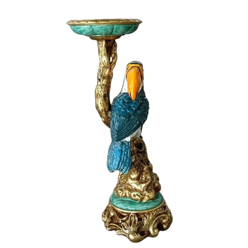 The Classical Toucan Pedestal Candle Stand is an elegant and distinctive home decor piece. Crafted with timeless design elements, it features a sturdy pedestal base adorned with intricate classical details. 