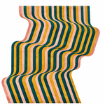 Colorful striped rug with wavy pattern on a white background