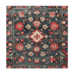 The Autumn Bloom Hand Tufted Rug features a stunning floral design in rich red and soft beige tones on a dark background. This elegant wool area rug is perfect for adding warmth and style to your living room. Ideal for those looking for square area rugs or wool rugs, it brings a cozy yet sophisticated touch to any living space.