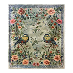 The Avian Serenade Hand Tufted Area Rug features a vibrant design with two colorful birds perched among blooming flowers and lush greenery. Perfect for enhancing your living room space, this 8x10 wool rug offers a touch of elegance and nature-inspired beauty, ideal for those seeking unique living room area rugs.
