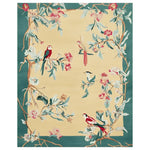 Birdsong Reverie Hand Tufted Area Rug featuring vibrant birds and floral patterns, ideal for large living room spaces. This wool rug showcases intricate design elements with a serene, nature-inspired theme, perfect for enhancing any living room decor.