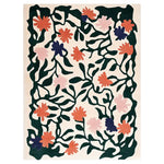The Blossom Celestial Hand Tufted Wool Rug showcases a vibrant floral design with bold, abstract flowers in shades of orange, pink, and purple, surrounded by dark green vines. This area rug brings a touch of nature-inspired elegance to any room.