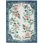 Blossom Frame Reverie Hand Tufted Area Rug featuring a beautiful floral design with pink roses and green leaves, bordered by intricate blue patterns. This wool rug is perfect for large living rooms, available in 8x10 size.