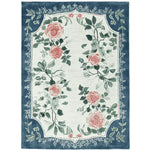 Blossom Frame Reverie Hand Tufted Area Rug featuring a beautiful floral design with pink roses and green leaves, bordered by intricate blue patterns. This wool rug is perfect for large living rooms, available in 8x10 size.
