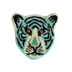 A vibrant Blue Tiger Face Hand-Tufted Wool Accent Rug, perfect for adding a unique touch to your office or living room. This area rug features a striking tiger design in shades of blue and black, ideal for wool rug enthusiasts looking to enhance their space with style.