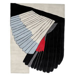 A contemporary wool area rug featuring an abstract design with bold geometric shapes in black, white, blue, and red. Perfect for large living room spaces, this hand-tufted rug adds a modern touch to any decor.