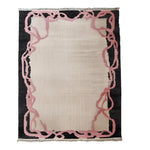 The Crimson Thread Hand Knotted Wool Rug features vibrant red tones and intricate patterns. Crafted from premium wool, it adds warmth, texture, and elegance to any room