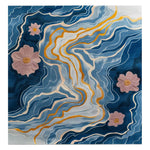 Ebb and Bloom Hand Tufted Wool Rug showcasing an abstract design with flowing blue and gold lines and delicate pink flowers, creating a serene and artistic area rug.