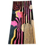Vibrant Evolving Shapes Hand Tufted Area Rug in 3' x 8' size, featuring bold abstract patterns in pink, gold, and black hues. Ideal for adding a striking touch to formal dining rooms or as a standout piece in living and dining room settings. Crafted from wool, this rug combines artistic design with durability.