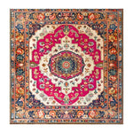 A vibrant Floral Fiesta Hand Knotted Area Rug featuring intricate floral patterns in shades of pink, cream, and blue, perfect as a square area rug for the living room or dining room. This vintage Persian-style wool rug brings elegance and warmth, ideal as a dining table rug or a centerpiece in any space.