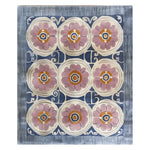 Top view of the Floral Revival Hand Tufted Wool Rug, showcasing its intricate design with large pink floral patterns against a blue and cream background. Perfect for adding a touch of elegance to any living room, this 8x10 area rug is crafted from high-quality wool.