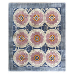 Top view of the Floral Revival Hand Tufted Wool Rug, showcasing its intricate design with large pink floral patterns against a blue and cream background. Perfect for adding a touch of elegance to any living room, this 8x10 area rug is crafted from high-quality wool.