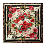 Flourish Fields Floral Wool Hand Knotted Area Rug, featuring vibrant red and pink floral patterns on a square design. This wool rug adds elegance to any living room, reminiscent of classic Persian rugs with its intricate detailing.