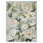 A beautiful hand-tufted area rug showcasing a contemporary floral design on a soft blue background. This wool rug features intricate beige and green flowers, making it a perfect addition to large living room spaces.