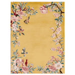 This stunning area rug features a hand-tufted wool design with an intricate floral and bird motif. The vibrant colors of pink, blue, and red against a golden background make it an ideal choice for living room area rugs. Perfect for adding a touch of elegance to any room, this wool rug is both stylish and durable, making it one of the best rugs for living room decor.