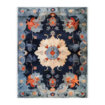Imperial Garden Hand Tufted Area Rug featuring an intricate vintage floral pattern in shades of blue, orange, and cream. This large wool rug is perfect for adding a touch of elegance to your office or living room. Ideal as a statement piece, this rug combines traditional charm with modern durability.