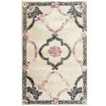 The "Ivory Bloom Border Hand Tufted Rug" is a timeless masterpiece inspired by vintage charm and intricate floral motifs. Its soft cream background highlights the delicate floral border, creating an elegant and inviting aesthetic. Hand-tufted from high-quality materials, this rug offers both durability and a plush feel underfoot, making it a perfect addition to any living space. Its classic design and neutral tones ensure it complements a variety of interior styles, adding a touch of sophistication to your