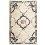 The "Ivory Bloom Border Hand Tufted Rug" is a timeless masterpiece inspired by vintage charm and intricate floral motifs. Its soft cream background highlights the delicate floral border, creating an elegant and inviting aesthetic. Hand-tufted from high-quality materials, this rug offers both durability and a plush feel underfoot, making it a perfect addition to any living space. Its classic design and neutral tones ensure it complements a variety of interior styles, adding a touch of sophistication to your