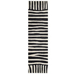 Top view of the Light Surge Hand Tufted Wool Runner Rug featuring a striking black and white abstract pattern. Perfect for adding a contemporary touch to kitchens, hallways, or bathrooms, this wool rug combines style and functionality.