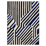 The Line Rhythm Hand Tufted Rug features a striking geometric pattern with bold black and blue stripes on a cream background. This contemporary wool rug is perfect for adding a modern touch to large living rooms. Ideal as an area rug for living room spaces, it combines style and comfort seamlessly.