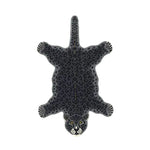 Top view of a Little Black Leopard Hand Tufted Wool Rug, ideal for living rooms. This large area rug features a unique leopard design, adding a touch of elegance to any living room decor. Perfect choice for those seeking stylish and cozy wool rugs in their living spaces.