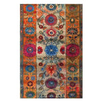 Vibrant Maharaja Garden Hand Tufted Area Rug featuring an intricate floral design with rich, colorful patterns ideal for dining room or bedroom decor. This wool rug is perfect for adding a touch of elegance to any bedroom space.