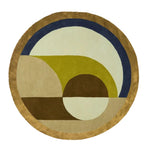 The Maia Golden Brown Round Hand Tufted Wool Rug features an abstract design with earthy tones of golden brown, green, and blue, perfect for adding warmth to bedrooms or living rooms. This round area rug is crafted from high-quality wool, making it a stylish and durable choice for bedroom area rugs and living room spaces.