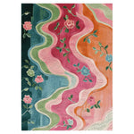 A vibrant Meadow in Motion hand tufted area rug featuring a stunning floral design with wavy patterns in pink, orange, blue, and green tones. This wool rug adds a lively touch to large living spaces, perfect as an 8x10 living room rug.