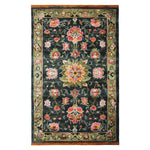The Midnight Bloom Mosaic Hand Tufted Rug is a stunning area rug featuring a vibrant floral design. This wool rug displays intricate patterns of blooming flowers in rich colors, ideal for adding elegance to large living room spaces. It's a perfect choice for those seeking area rugs for living room decor.