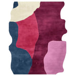 A vibrant, hand-tufted area rug featuring an abstract design with bold colors including deep blue, rich burgundy, soft pink, and cream. This contemporary wool rug is perfect as a large living room rug, adding a stylish and artistic touch to any space.