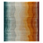 Nature's Hues Hand Tufted Wool Rug showcases an elegant wave pattern in a blend of blues, greys, and earthy tones, perfect as a contemporary area rug. This wool rug is ideal for adding a stylish touch to living rooms, particularly in an 8x10 size.