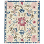 A beautifully crafted ornate flora fringe hand-tufted area rug, showcasing an intricate floral design with vibrant pink, blue, and beige hues. Perfect for adding elegance to living room area rugs. This wool rug is ideal for those seeking large living room rugs with a touch of nature-inspired charm.
