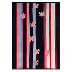 Contemporary Parallel Petals Hand Tufted Area Rug featuring colorful vertical stripes in red, blue, and cream, with abstract pink petal designs. Perfect wool rug for adding a modern touch to living rooms.