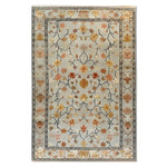 Elegant Persian Petals Hand Tufted Wool Rug featuring a harmonious floral design with intricate patterns in warm tones, perfect for enhancing living room spaces. This area rug adds a touch of sophistication and warmth, making it an ideal choice for those seeking stylish and durable wool rugs for their living room.