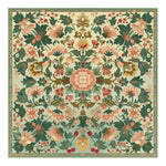 A beautifully designed Petal Medallion Echo Hand Tufted Rug, showcasing a vibrant floral pattern in warm tones. This square area rug is perfect for adding elegance to large living rooms. Made from quality wool, it serves as a stunning floral rug option for those seeking unique rugs for living room decor.