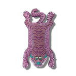 The Pink Tibetan Tiger Accent Wool Rug features a unique and vibrant tiger design, ideal for enhancing your living room decor with its vintage appeal. This large area rug, crafted from high-quality wool, adds a stylish and exotic touch to any space, perfect for those looking to elevate their home with distinctive living room area rugs.