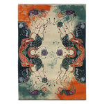 Pomegranate Dreams Hand Tufted Wool Rug featuring vibrant abstract designs in rich colors. This area rug, perfect for large living rooms, showcases vintage patterns with intricate details, making it a standout piece among wool rugs.