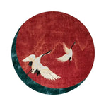 Round area rug featuring an elegant design of red flying Japanese cranes, perfect for adding a touch of sophistication to living rooms or offices. This wool rug, measuring 8x10, embodies a unique blend of art and functionality, making it an ideal choice for those seeking stylish living room rugs or versatile office decor.