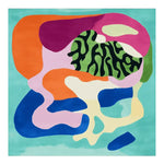 Luxurious hotel lobby with a colorful rug, furniture and decor